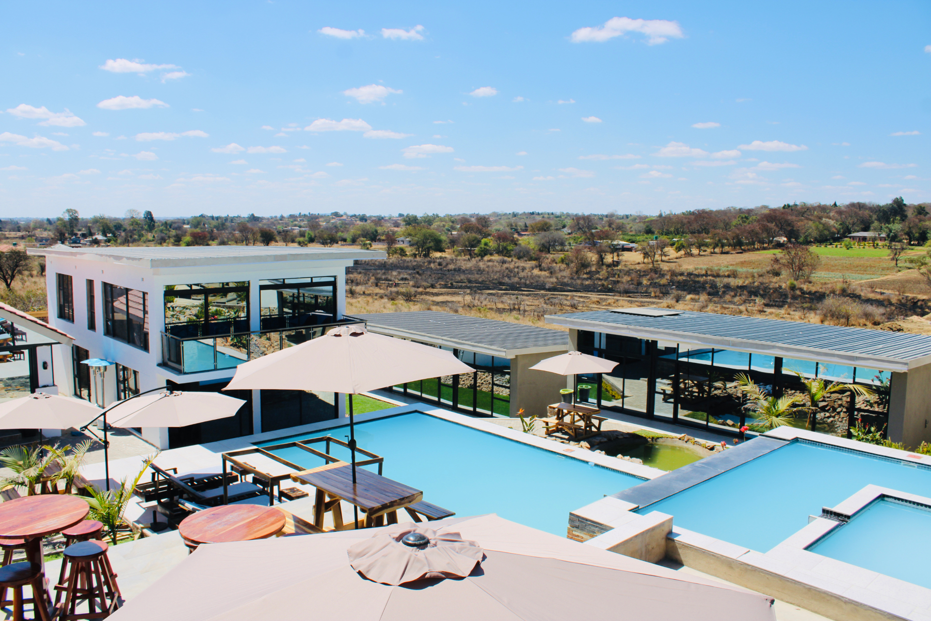 The swimming pool and sun terrace at Lions Gate Villas, Bulawayo